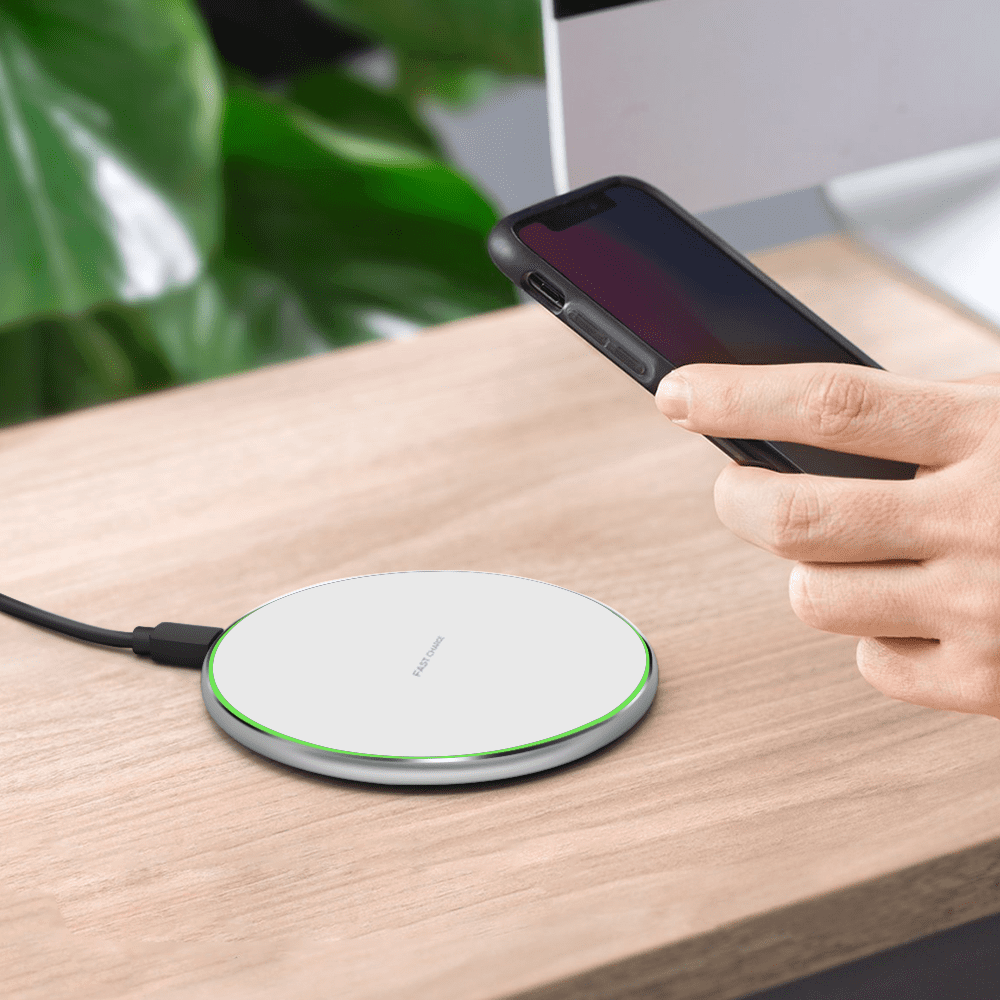 QI Enabled Wireless Charger Used for Charging Smartphone
