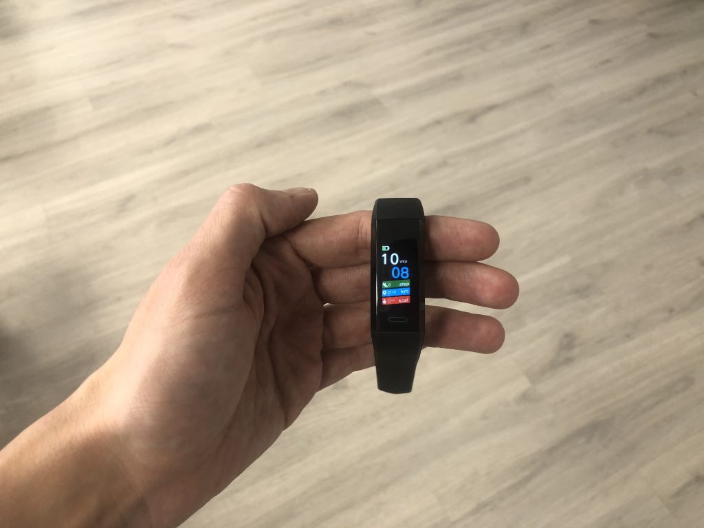 Xtreme Band Track Fitness Tracker on palm