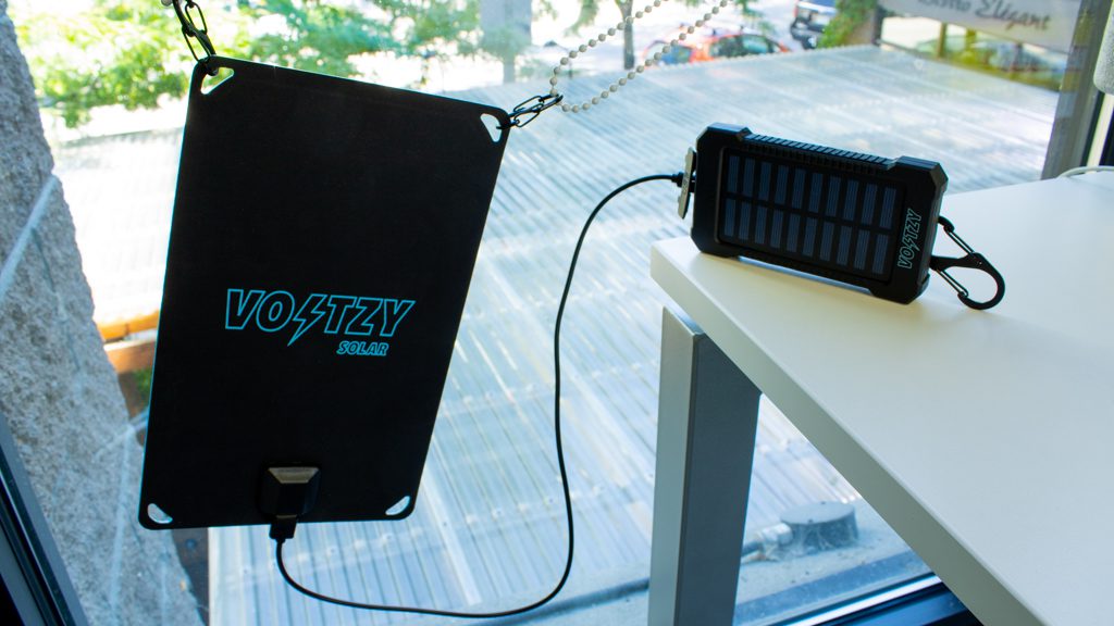 Voltzy being charged by solar energy