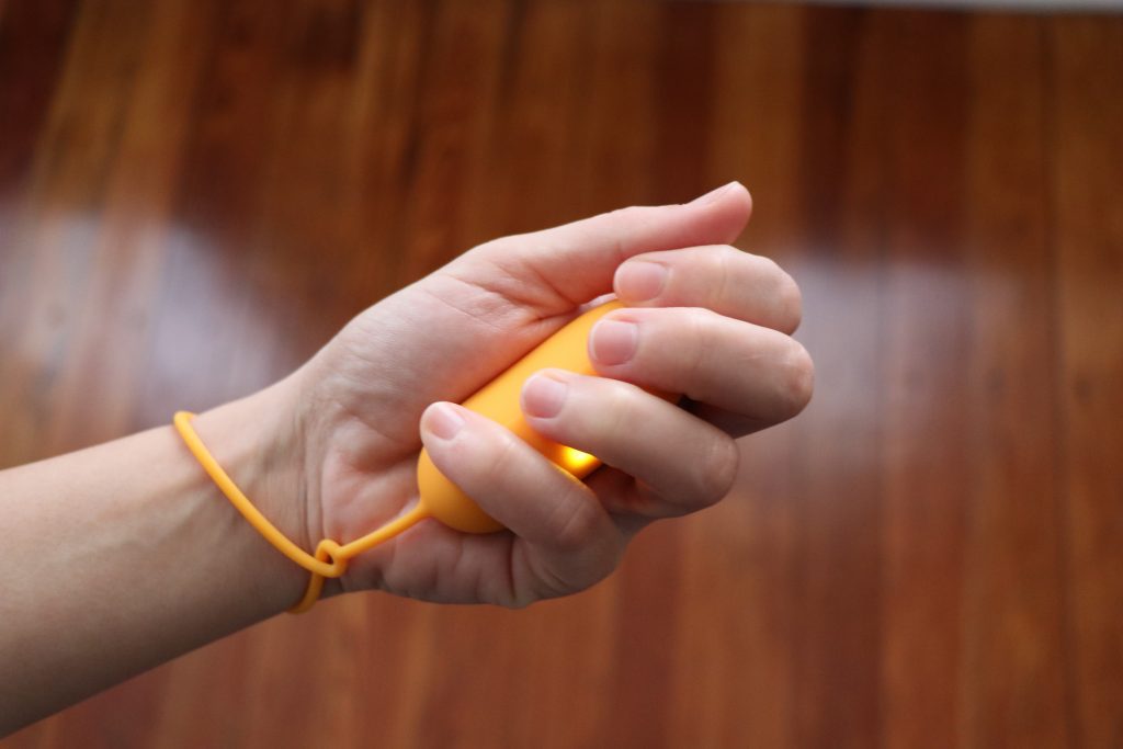 Holding Mend Your Mental Chill Pill in hands to reduce anxiety